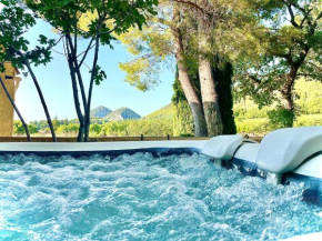 Entre vignes et horizon Appartement avec jacuzzi privatif et piscine commune chauffée